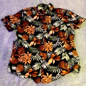 A flannel black orange and green button up teeshirt
